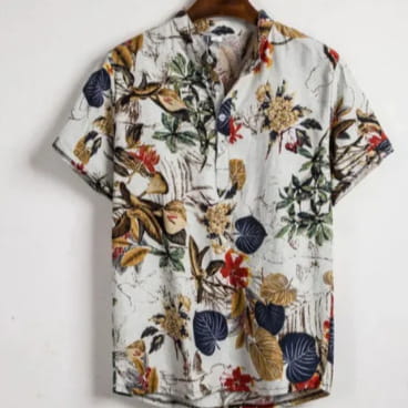 White short-sleeved Hawaiian shirt for men featuring a vibrant floral pattern with red, yellow, blue, and green flowers and leaves.
