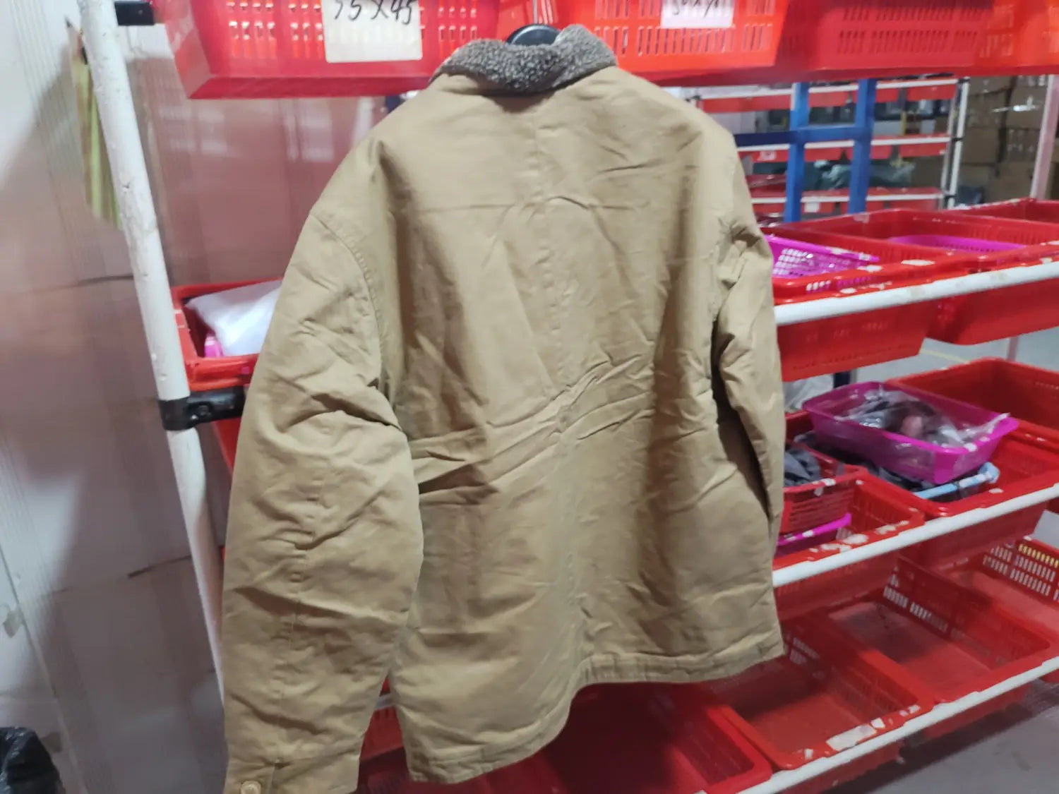 Beige mens fleece lined winter cotton jacket with a gray fleece lined collar.