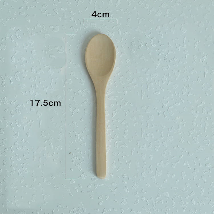 A light beige wooden spoon with a smooth natural finish and simple oval-shaped bowl from a wooden spoon set natural eco-friendly kitchen utensils.