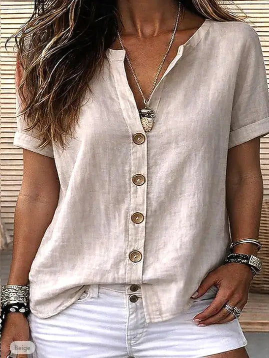 Beige linen short sleeve button up cardigan for women featuring gold toned buttons.