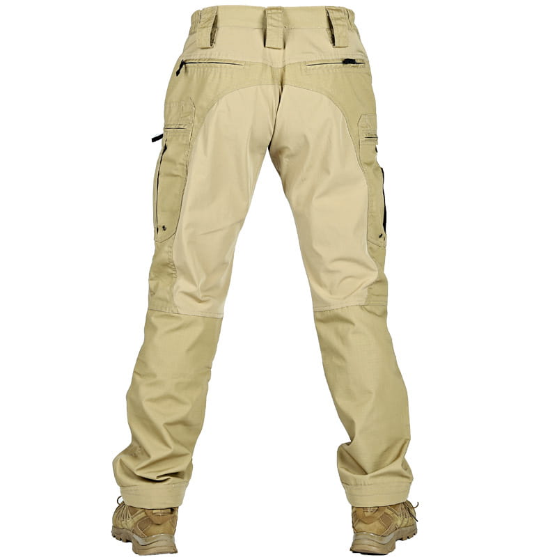 Pantalons cargo tactiques beige pour hommes, avec plusieurs poches et panneaux de genoux renforcés, conçus comme des pantalons militaires.