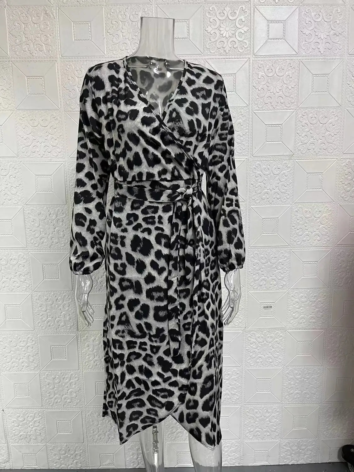 Black and white leopard print chiffon wrap dress with v neck long sleeves and self-tie belt.
