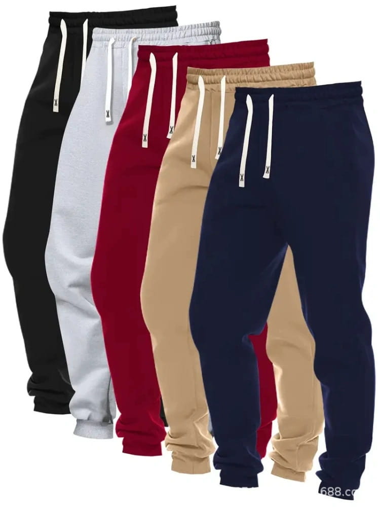 Men’s 5-pack solid jogger pants featuring five pairs of sweatpants in black white red beige and navy blue with matching drawstrings and a small x logo.