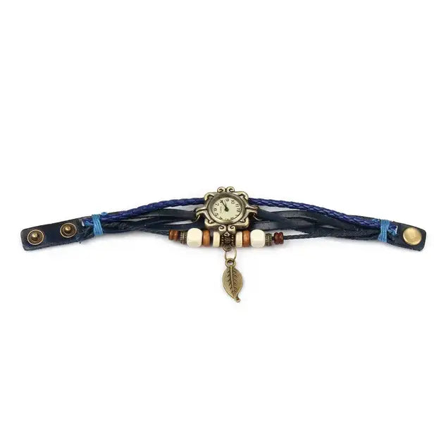 Bohemian blue braided leather wrap watch featuring a vintage-style brass face and leaf charm.