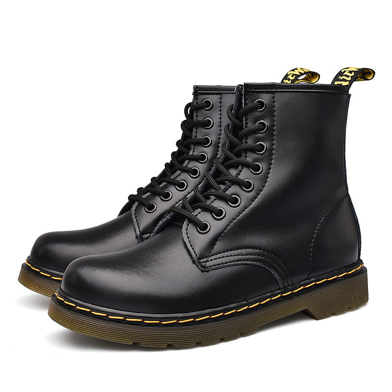 black leather dr martin boots featuring burgundy leather with yellow stitching shown from the back side