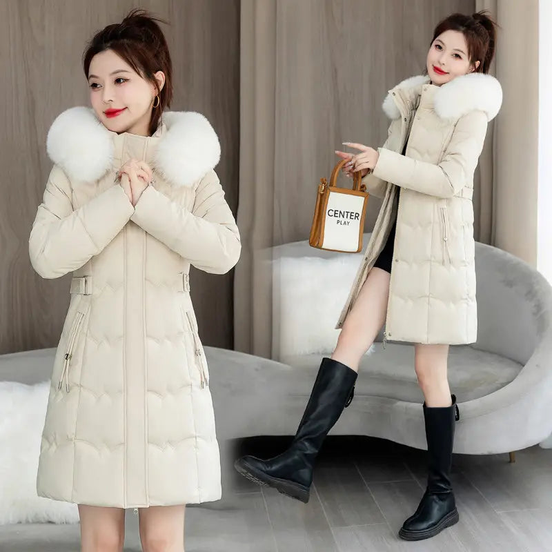 Beige quilted winter coat with a plush white fur-lined hood designed for cold weather.