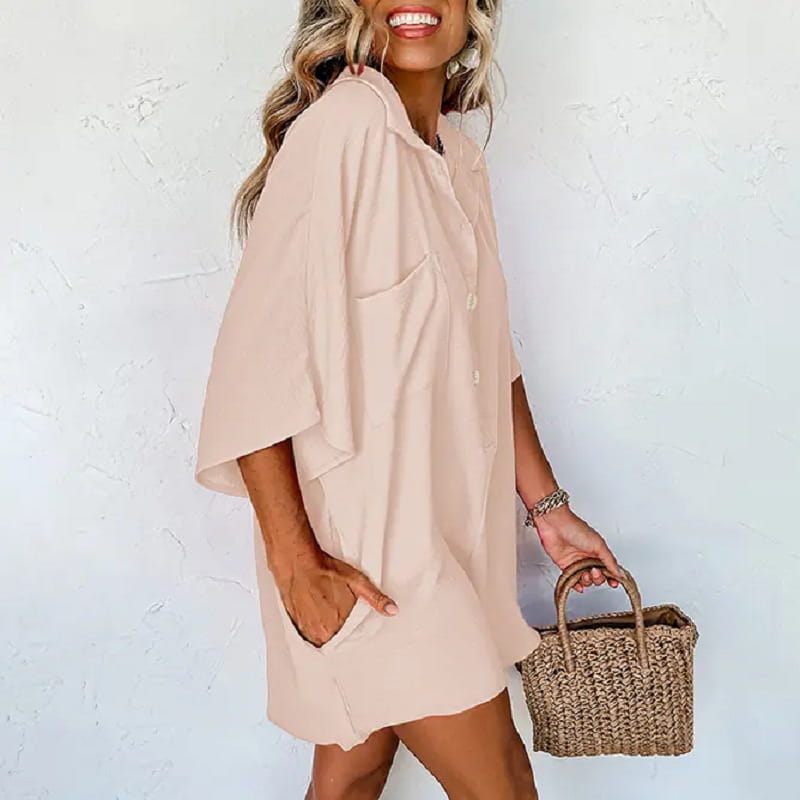 Beige oversized button-up summer jumpsuit dress with relaxed fit and side pockets perfect for casual wear.