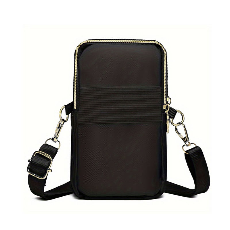 Black nylon Halloween pumpkin Snoopy embroidered crossbody phone bag with gold-toned zipper trim and adjustable strap.