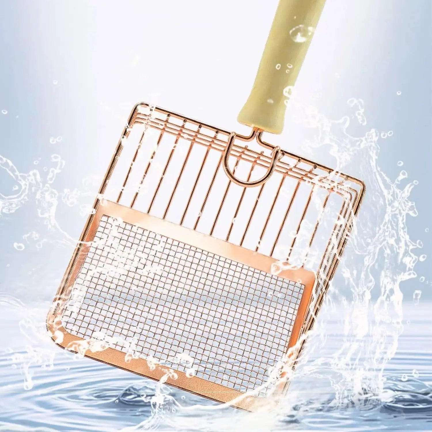 rose gold metal cat litter scoop with a wood handle featuring a rose gold-colored metal mesh grill and a light green handle designed for outdoor cooking.