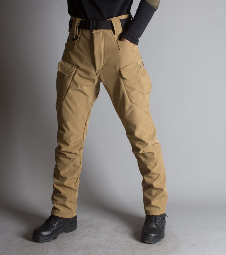 Ix7 mens fleece lined tactical cargo pants in tan with multiple pockets and durable fabric designed for work and outdoor use.