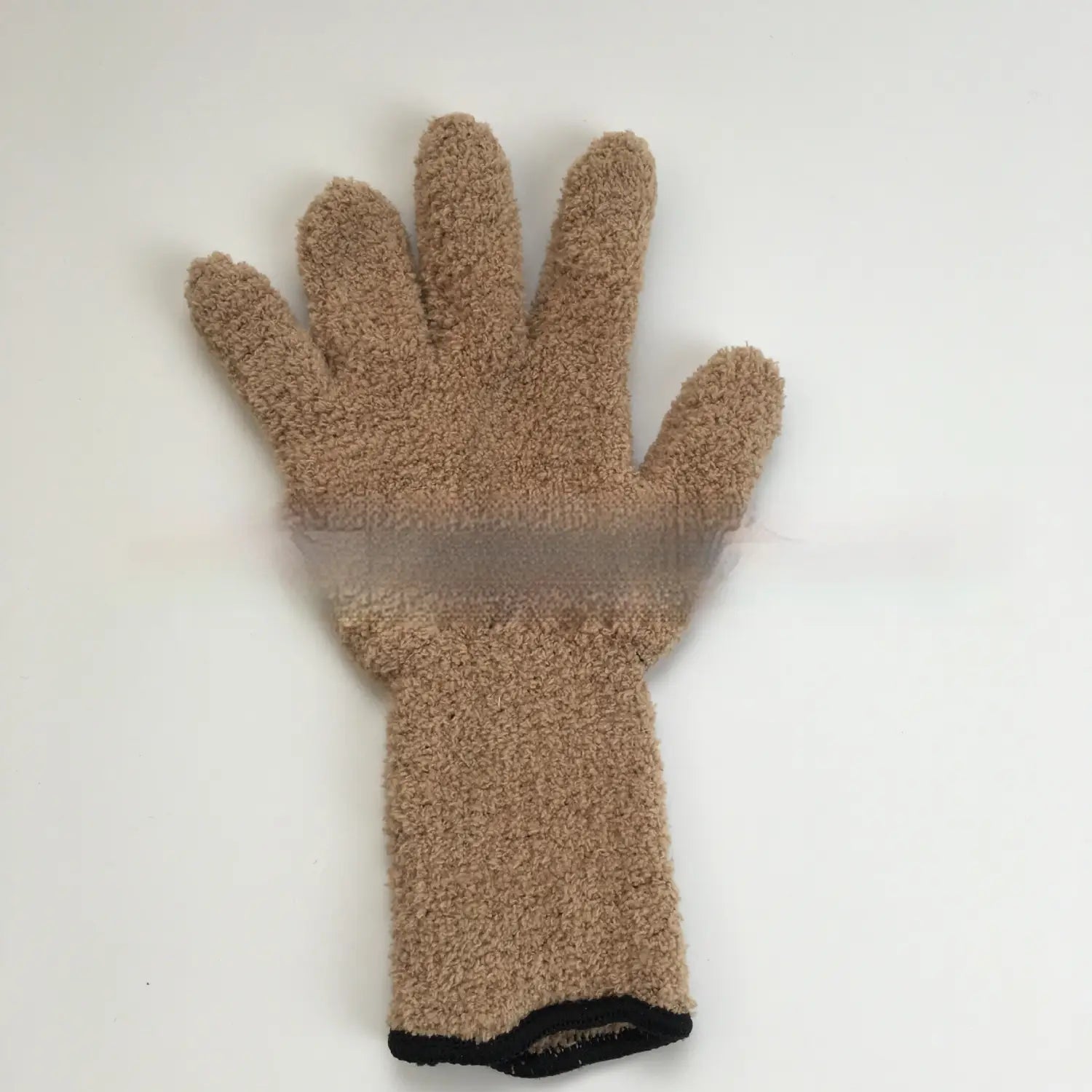 Tan plush coral fleece bath dust glove with black trim at the wrist designed for gentle cleaning.