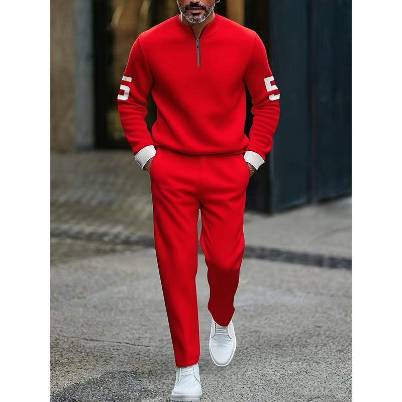 Vibrant red half zip athletic sweatsuit printed set with white numerals on the sleeves and contrasting white cuffs paired with matching pants.