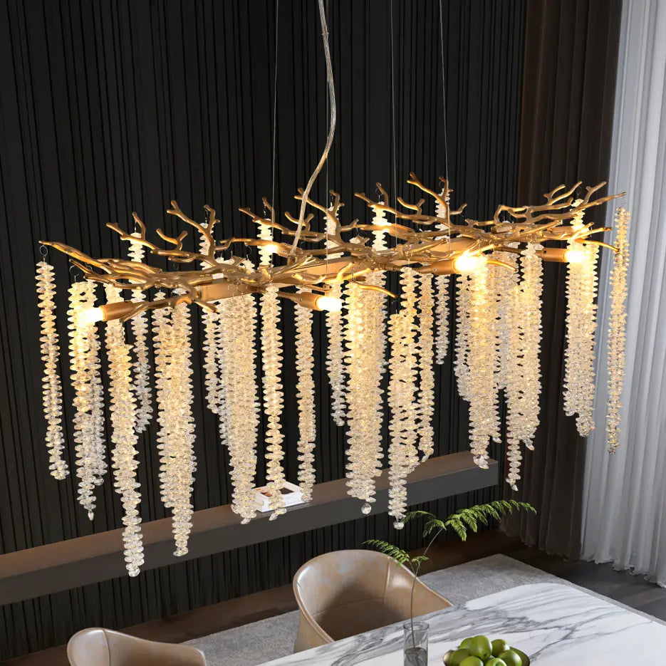 39 inch golden crystal waterfall pendant light featuring a golden branch-shaped chandelier adorned with cascading strands of clear faceted crystal beads.
