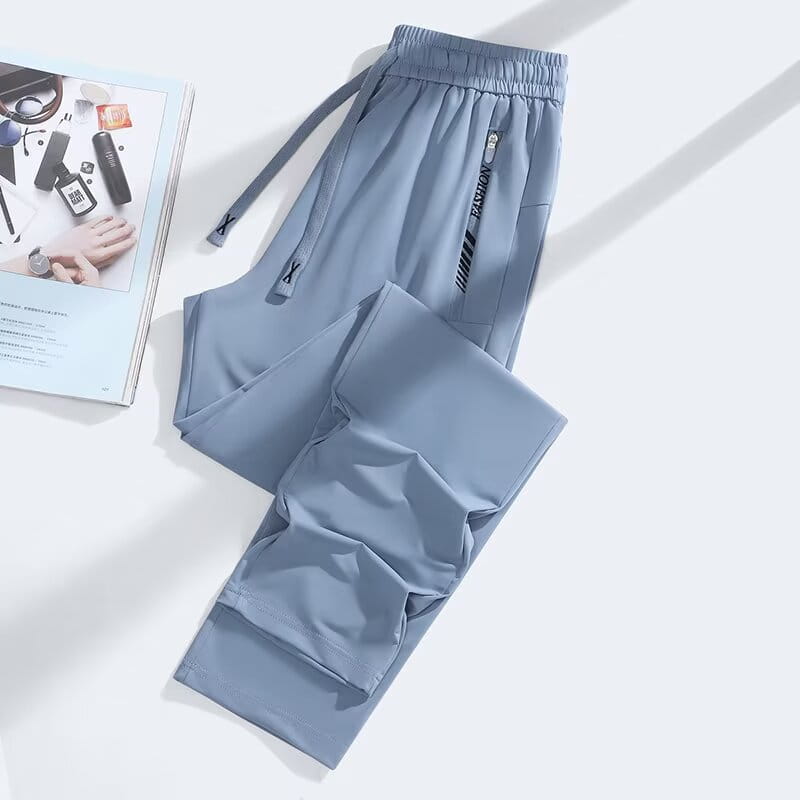 light blue anti-mosquito casual athletic trousers with a drawstring waistband and side zipper pockets designed for outdoor activities
