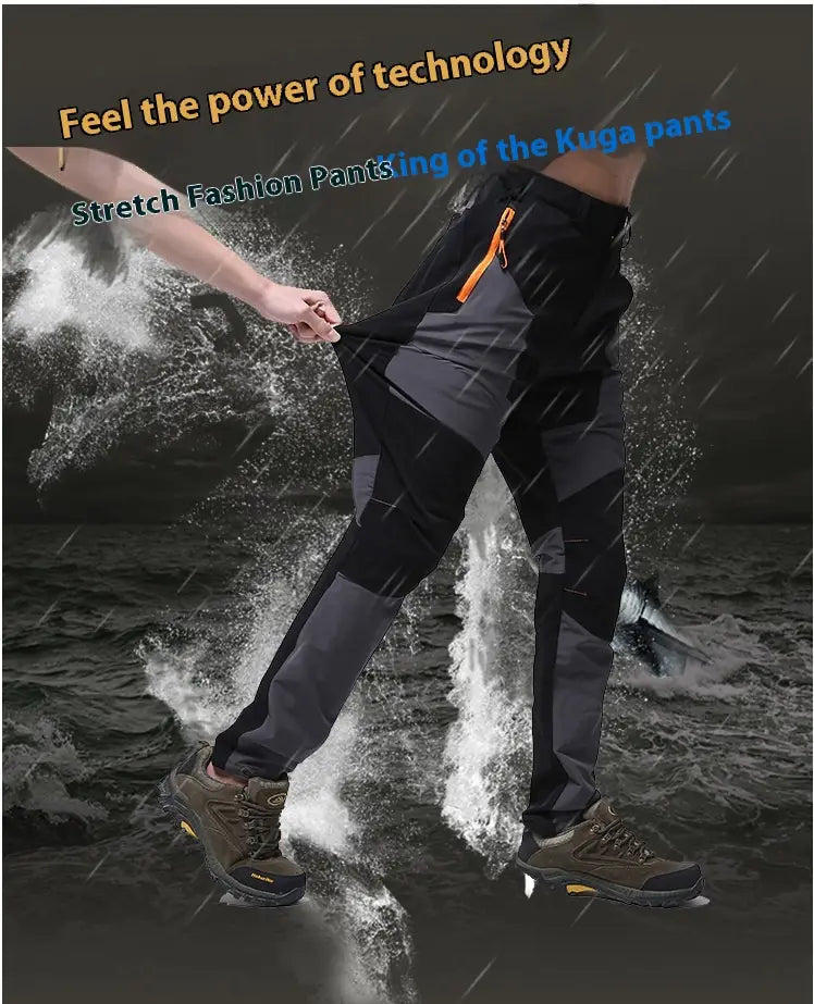 Men’s waterproof tactical hiking pants in black and gray stretch fabric with orange zipper accents.