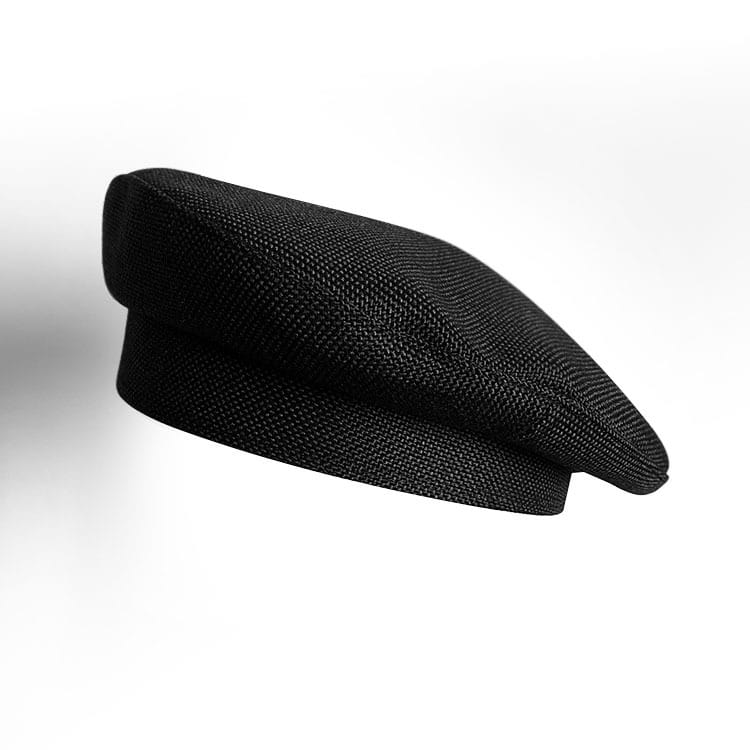 Béret en laine texturé noir pour femmes, avec une calotte structurée légèrement arrondie et une bordure souple
