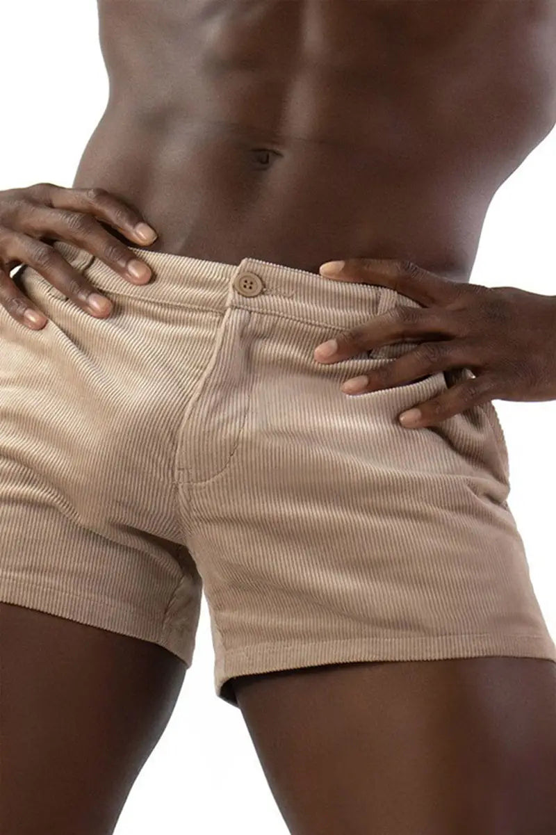 Beige corduroy men beach shorts with button closure and visible stitching for casual mid rise wear.