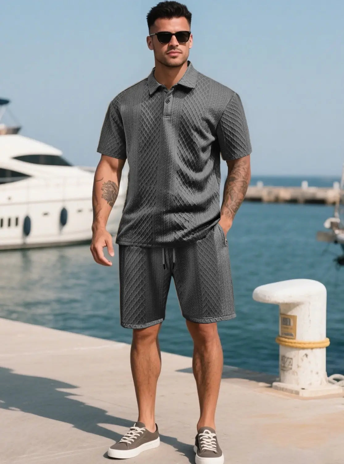 Men textured short sleeve polo suit in gray featuring a subtle diamond pattern with matching shorts and a drawstring waist.