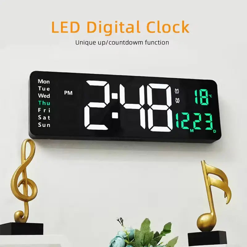 Black led digital wall clock with white and green illuminated numerals displaying time day of week temperature and date featuring remote control and dimmer function.