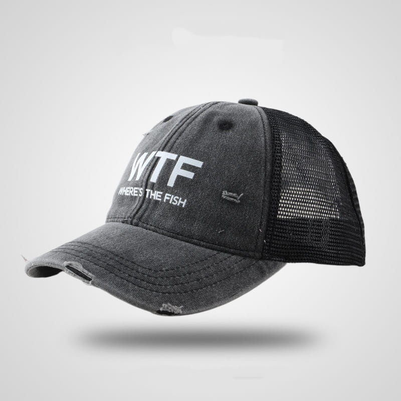 Black distressed fishing trucker hat with white wtf where’s the fish embroidered text and mesh back panel.
