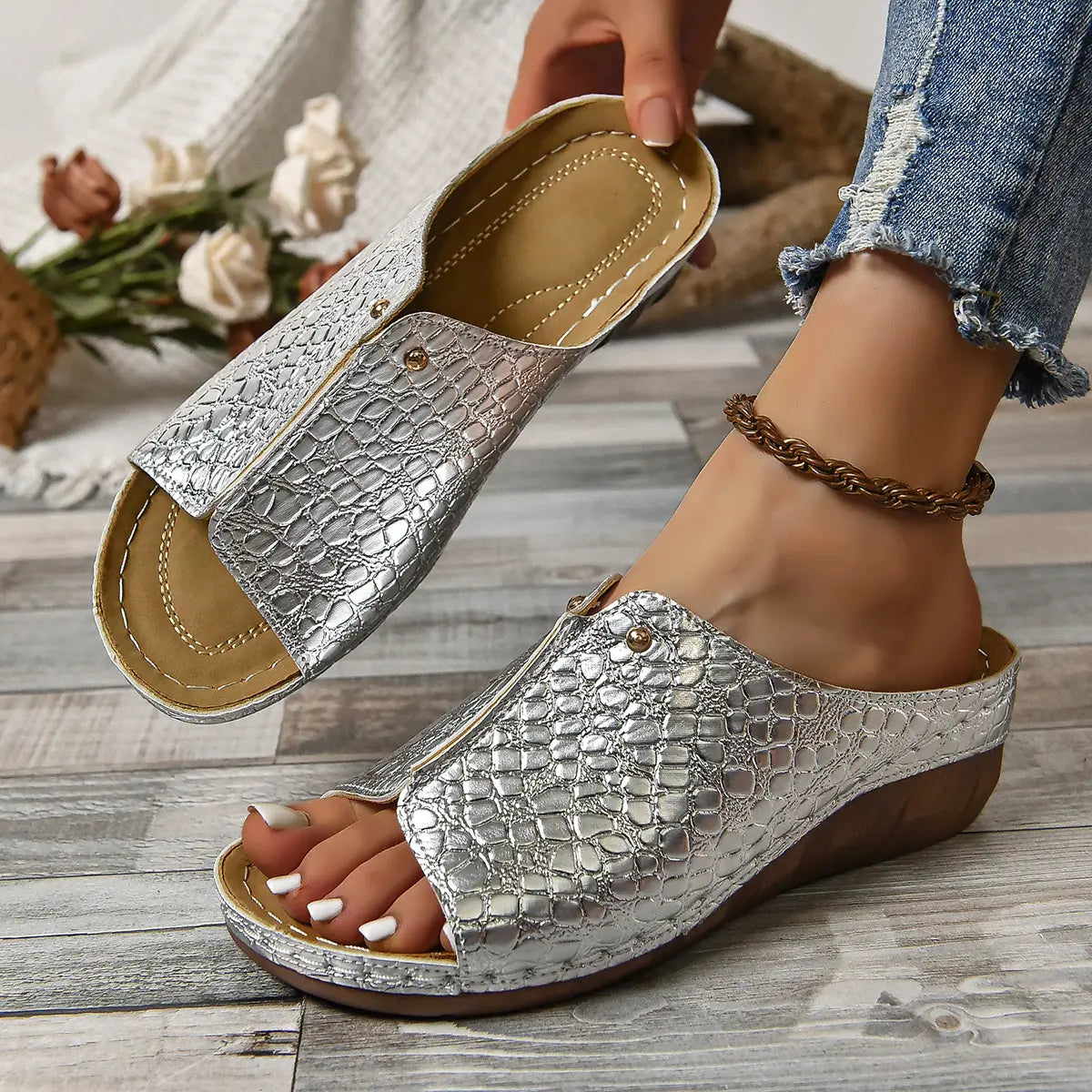 white crocodile-embossed platform wedge sandals for women with brown sole and gold-tone metal accents