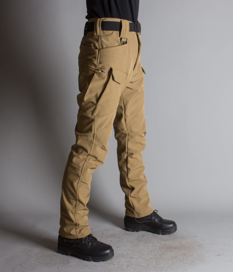 Tan ix7 mens fleece lined tactical cargo pants featuring multiple cargo pockets and a black belt.