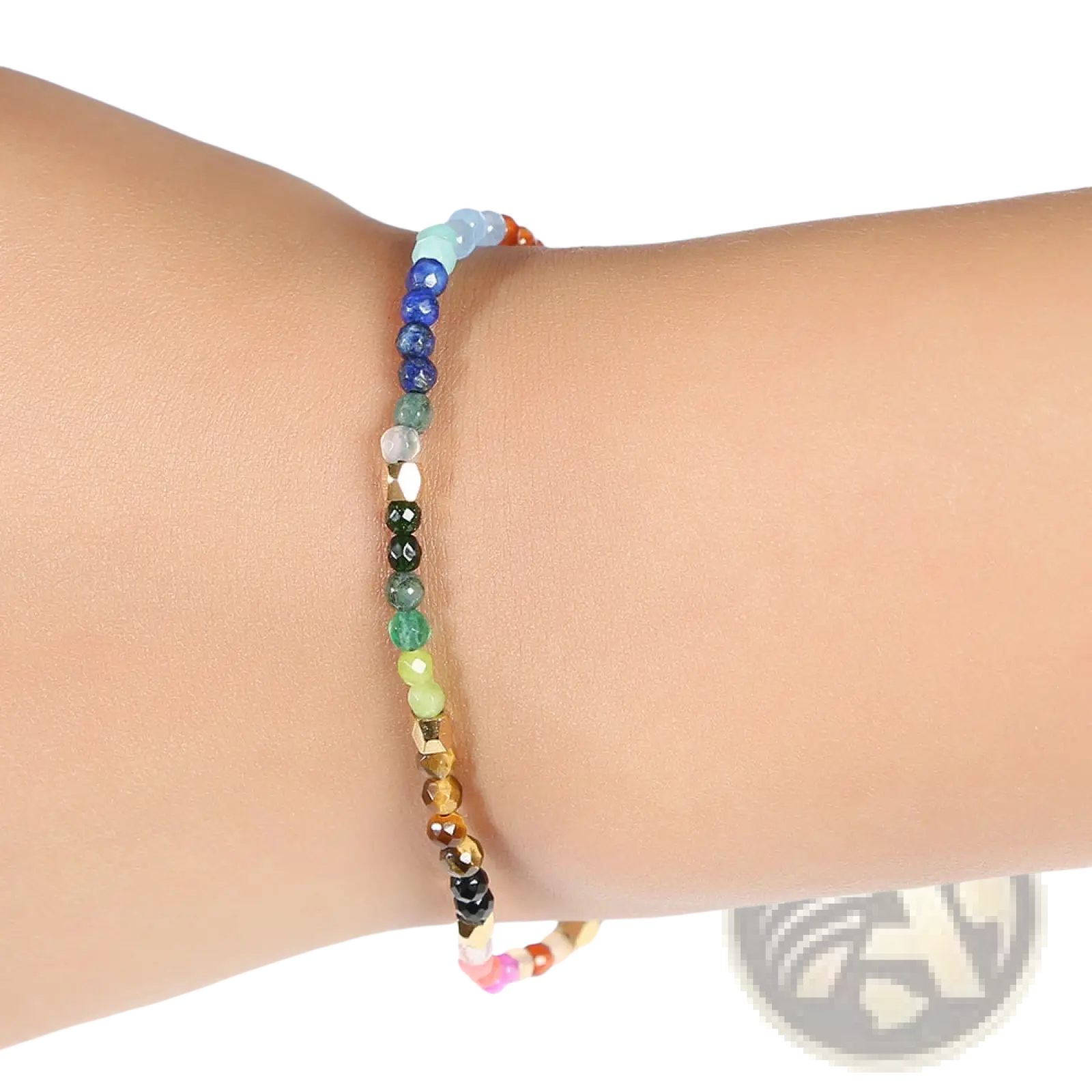 A colorful 7 chakras constellation agate bracelet with multicolored gemstones and gold-toned metallic spacers