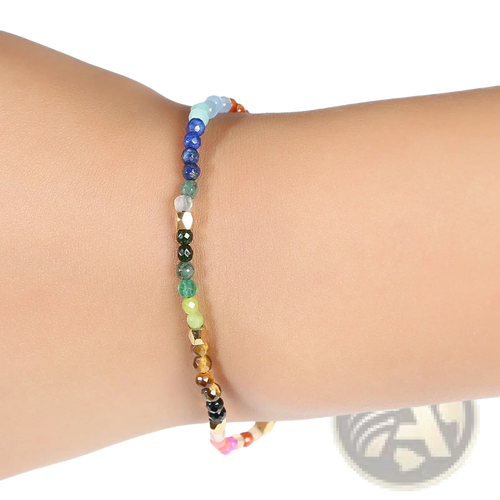 A colorful 7 chakras constellation agate bracelet with multicolored gemstones and gold-toned metallic spacers