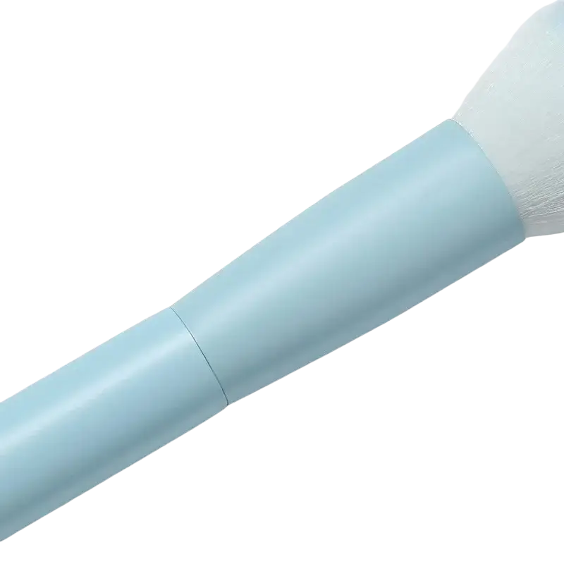 A soft pastel blue makeup brush with matte handle and fluffy white bristles from a 7 piece pastel brush set