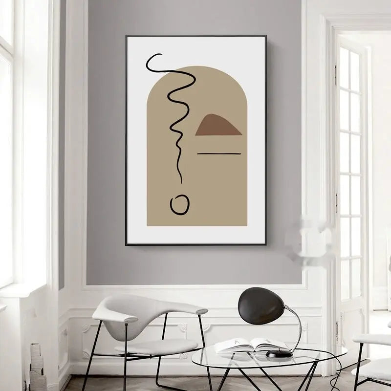 Minimalistischer abstrakter Wandkunst-Canvas-Druck mit erdigen beigen und braunen geometrischen Formen sowie kräftigen schwarzen Linienzeichnungen in einem eleganten schwarzen Rahmen.