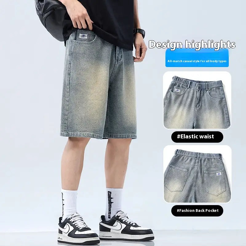 Men’s elastic waist light wash denim shorts shown from the back with a fashion back pocket.
