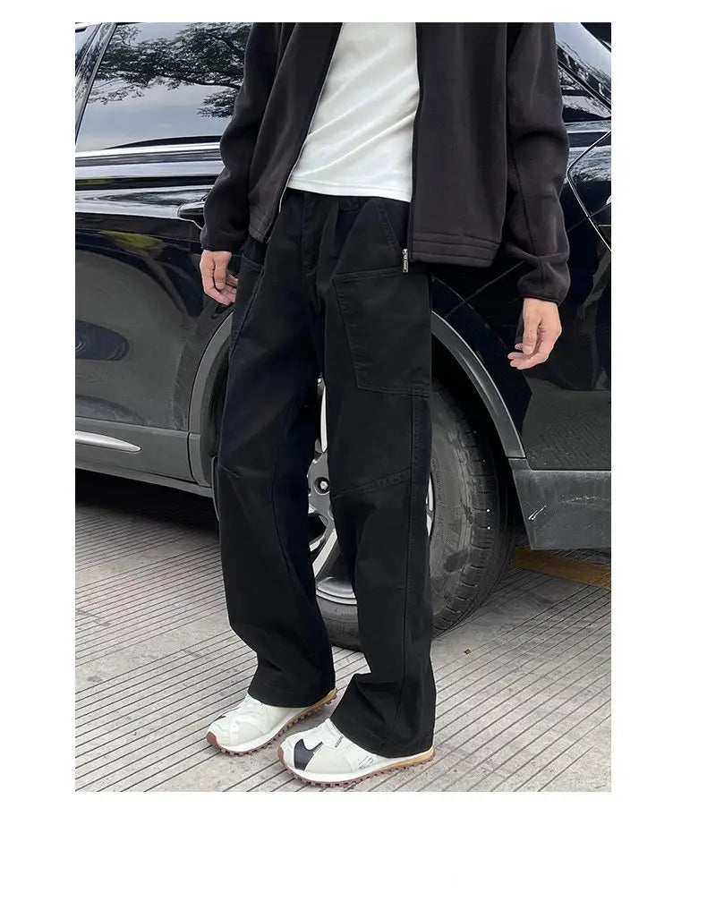 black cotton cargo pants with multiple pockets and a relaxed fit for mens workwear