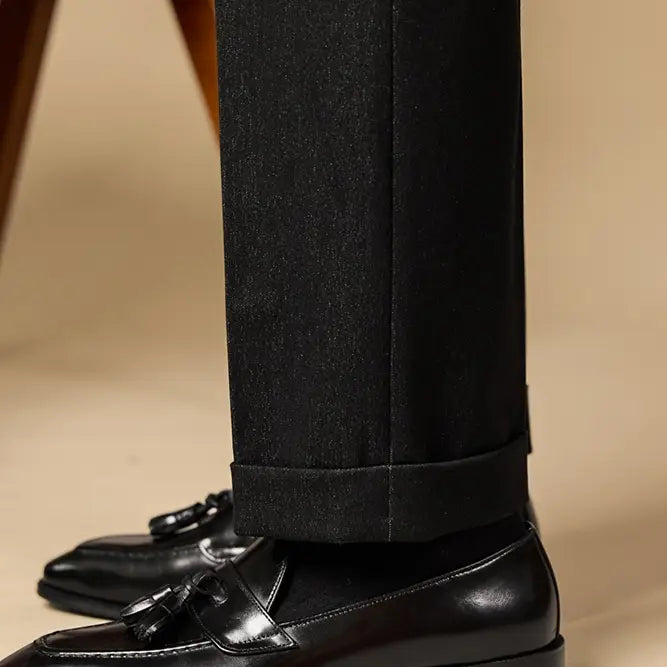 polished genuine leather tassel loafers in black patent leather with a glossy finish and classic design