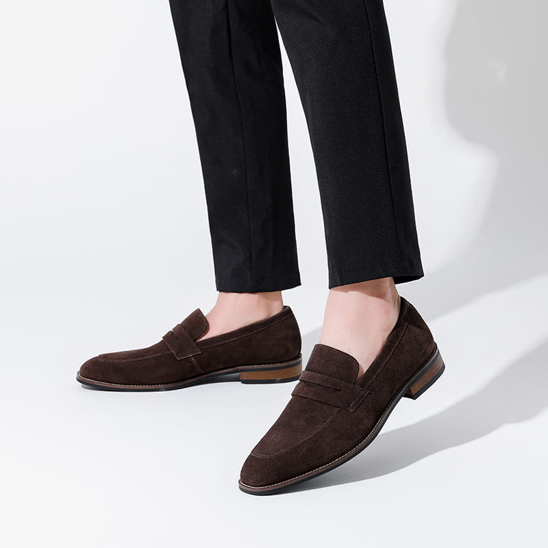 Men’s brown suede penny loafer casual leather shoes featuring a classic slip-on design with contrasting dark brown soles.
