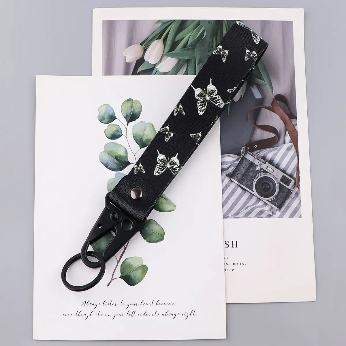 Black butterfly wrist strap keychain with white butterfly pattern and black metal clip model Tk57