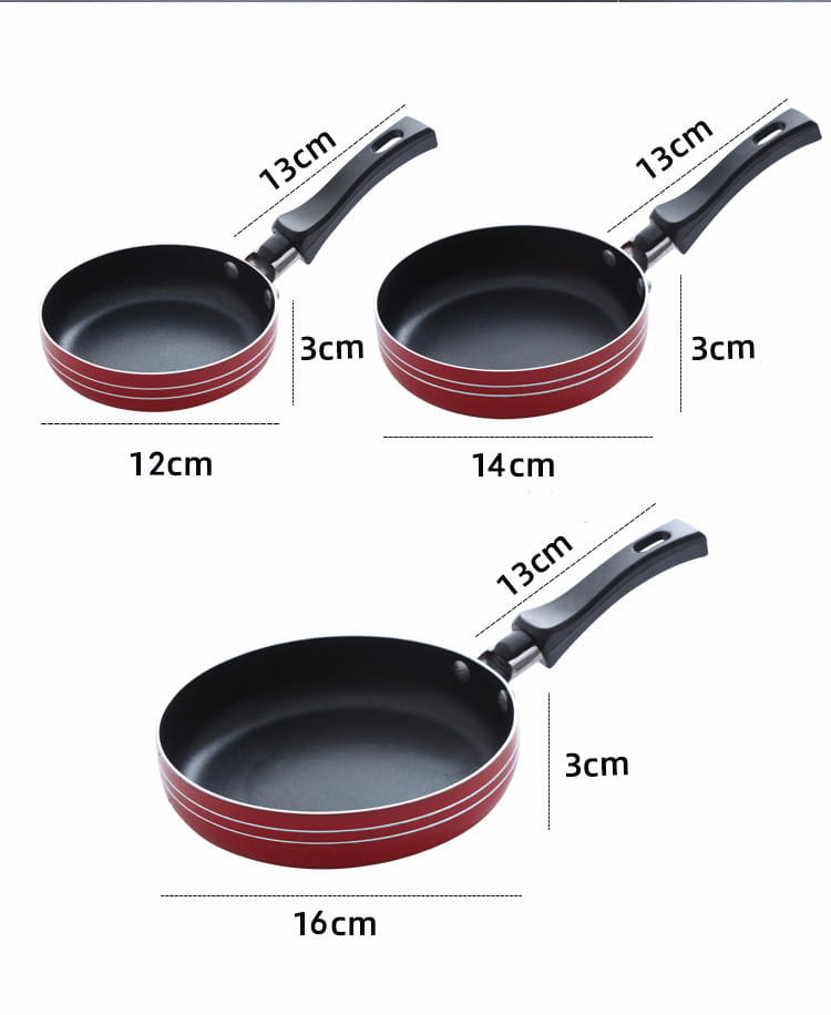 Set of three red aluminum mini non-stick frying pans with black handles and white accent stripes for versatile cookware use.