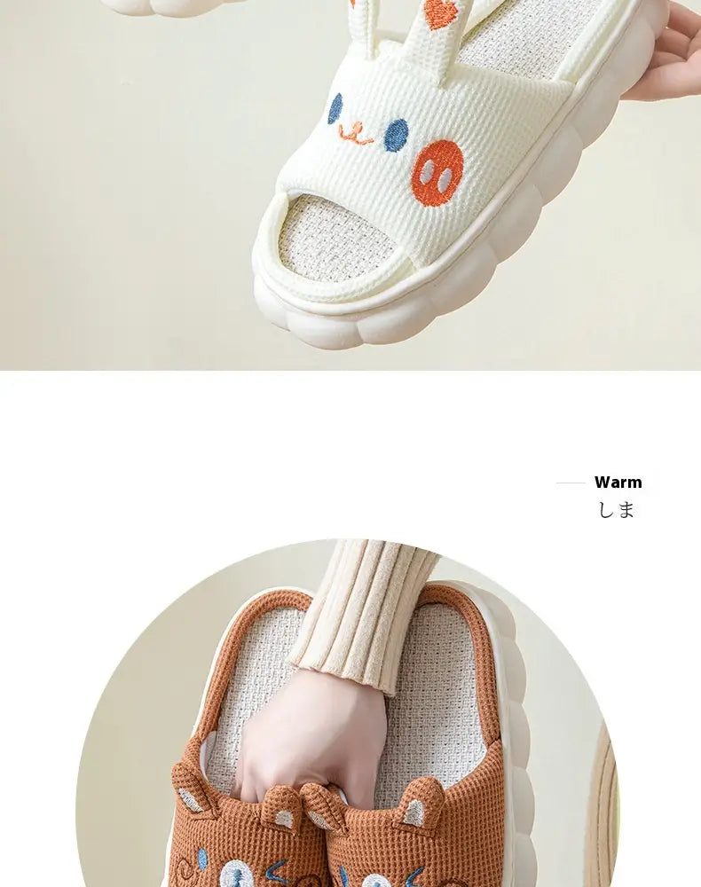White bunny-themed slide sandals with embroidered blue eyes and orange nose featuring a soft knit fabric upper in linen material for comfortable open toe wear.