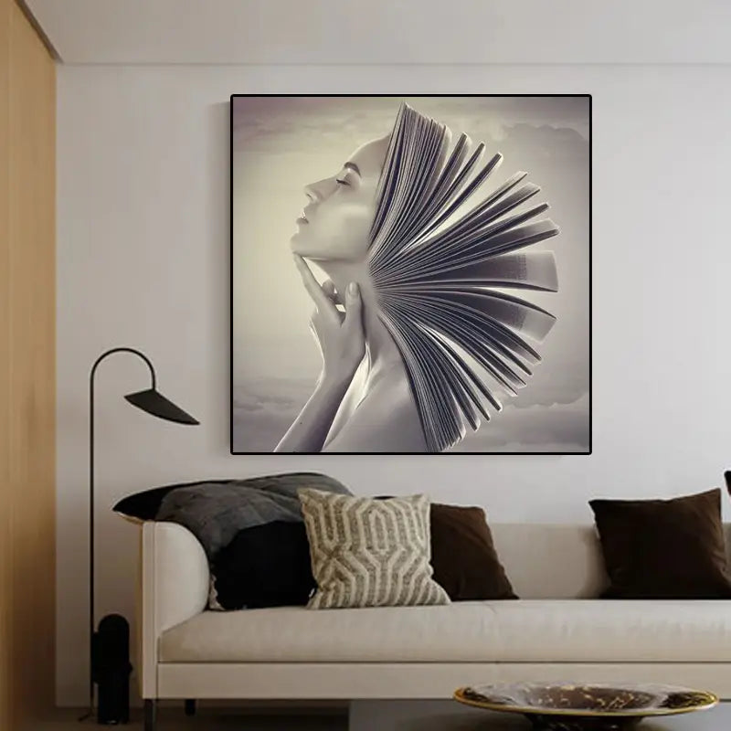 Arte mural en lienzo con marco negro que representa a una mujer de perfil con un libro abierto que se despliega detrás de su cabeza, titulado "book head woman profile framed canvas wall art".