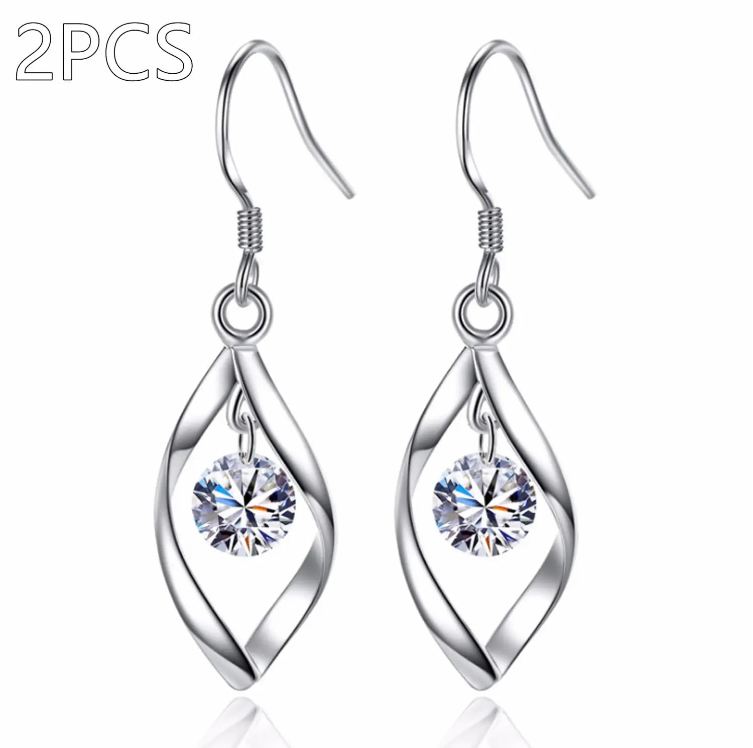 Silver teardrop-shaped earrings with a twisted wire design and a clear faceted crystal dangling at the center.