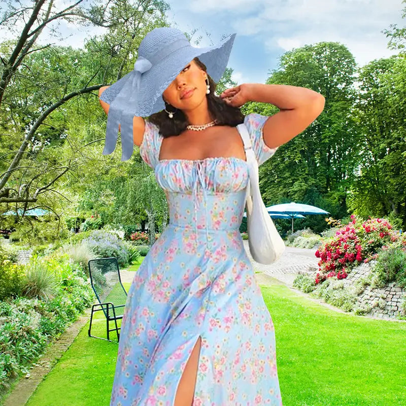 A light blue floral print midi dress with puff sleeves square neckline and side slit.