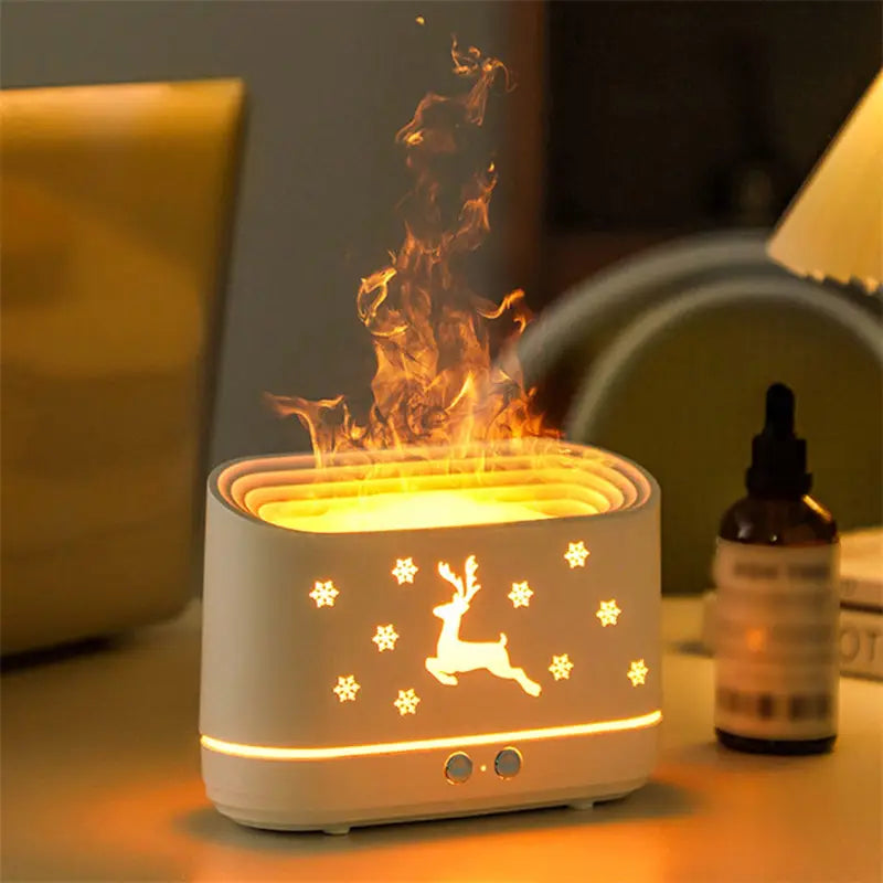 White ceramic elk flame humidifier Christmas oil diffuser featuring a glowing reindeer and snowflake design emitting warm light from its base.
