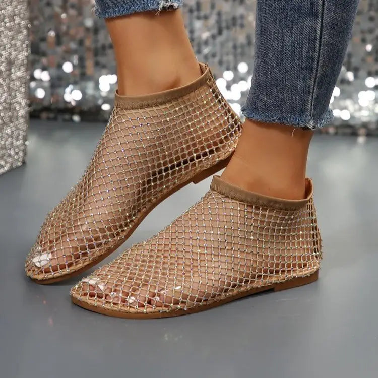 Gold mesh flat ankle boots for women featuring sparkling rhinestone detailing and a flat sole.
