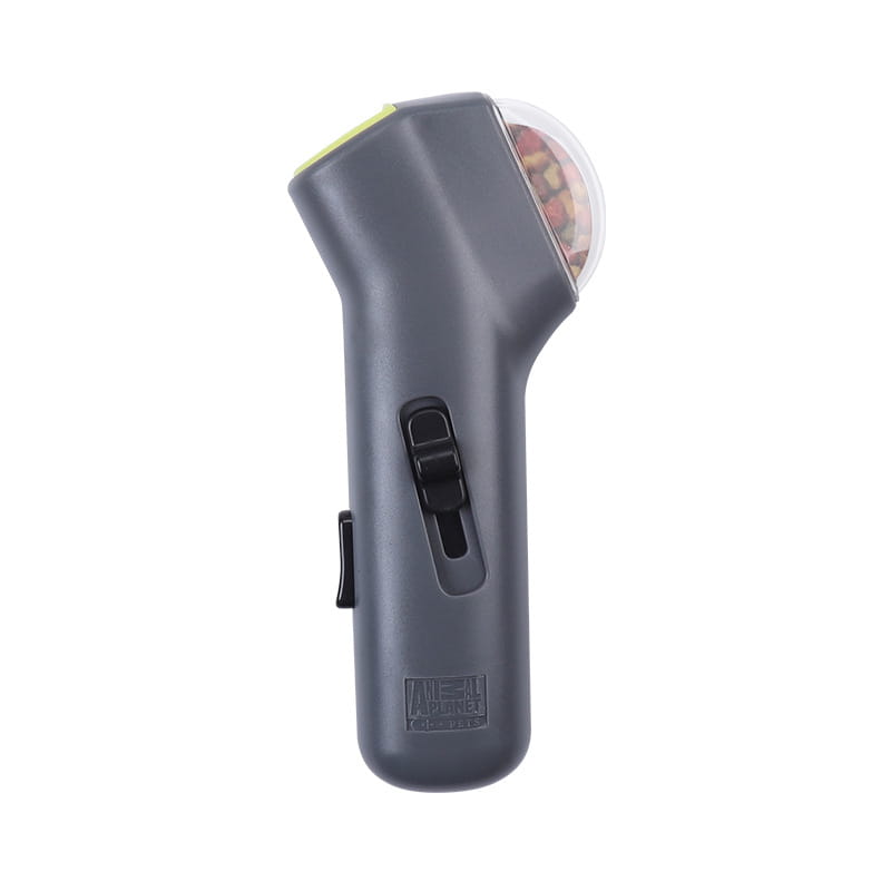 Lanceur de friandises pour chien portatif télécommandé en plastique gris, jouet pour animal de compagnie, avec dôme transparent révélant des graines colorées à l’intérieur