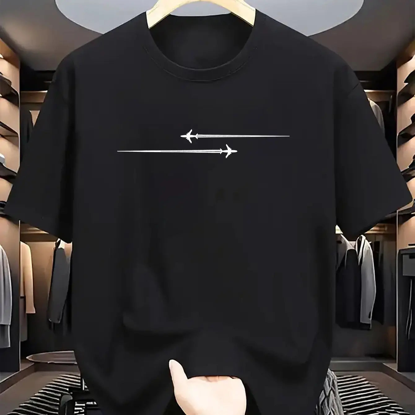 Black short-sleeved cotton blend sport t shirt featuring a minimalist white airplane graphic design.
