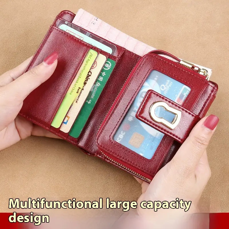 Red leather womens leather rfid large capacity buckle wallet with a gold-tone keyhole-style clasp and multiple card slots.