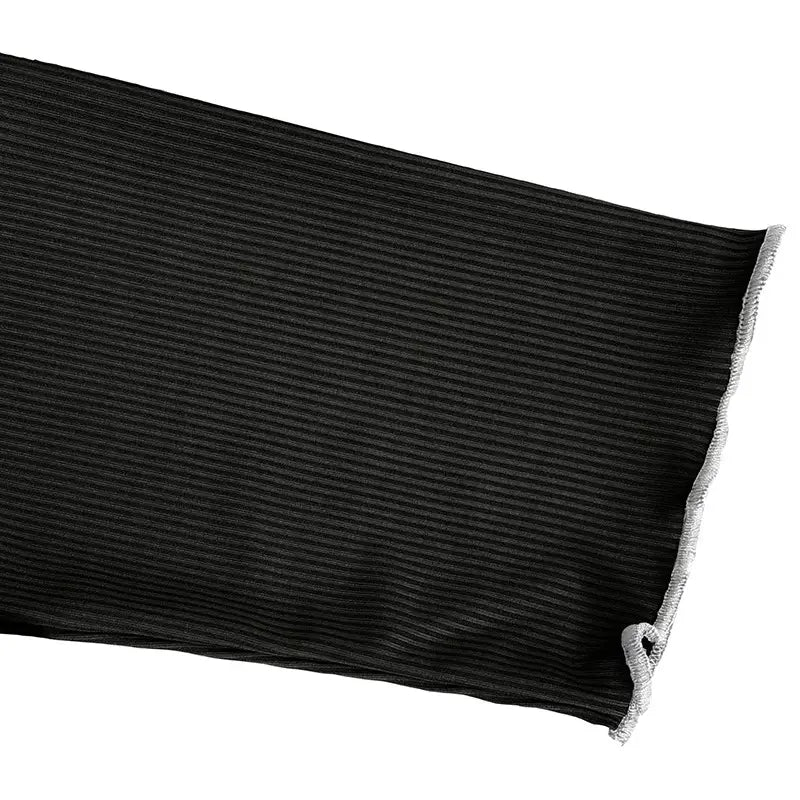 black ribbed fabric with vertical pleated texture and contrasting white frayed edges on a women’s ruffled ribbed knit slim fit mock neck top.