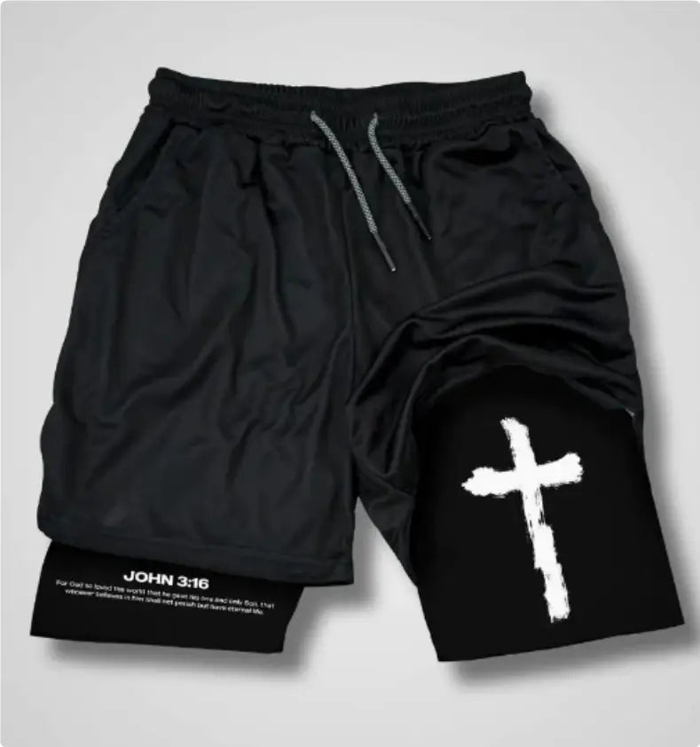 black faith graphic athletic shorts featuring a white cross graphic on the left leg and john 3:16 text near the hem for sports and active wear.