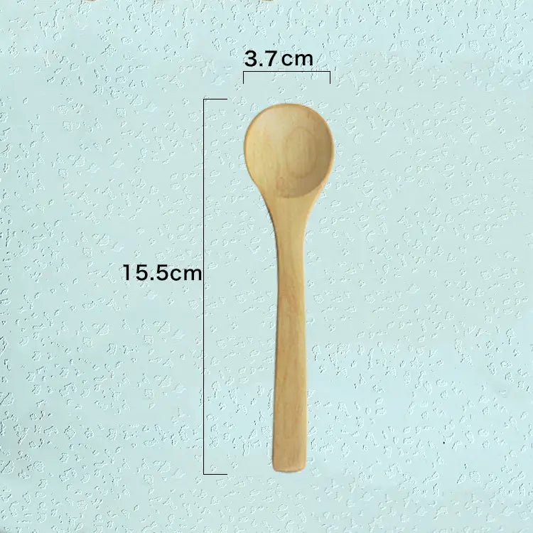 A light-colored wooden spoon with a smooth natural finish and simple design from a wooden spoon set natural eco-friendly kitchen utensils.