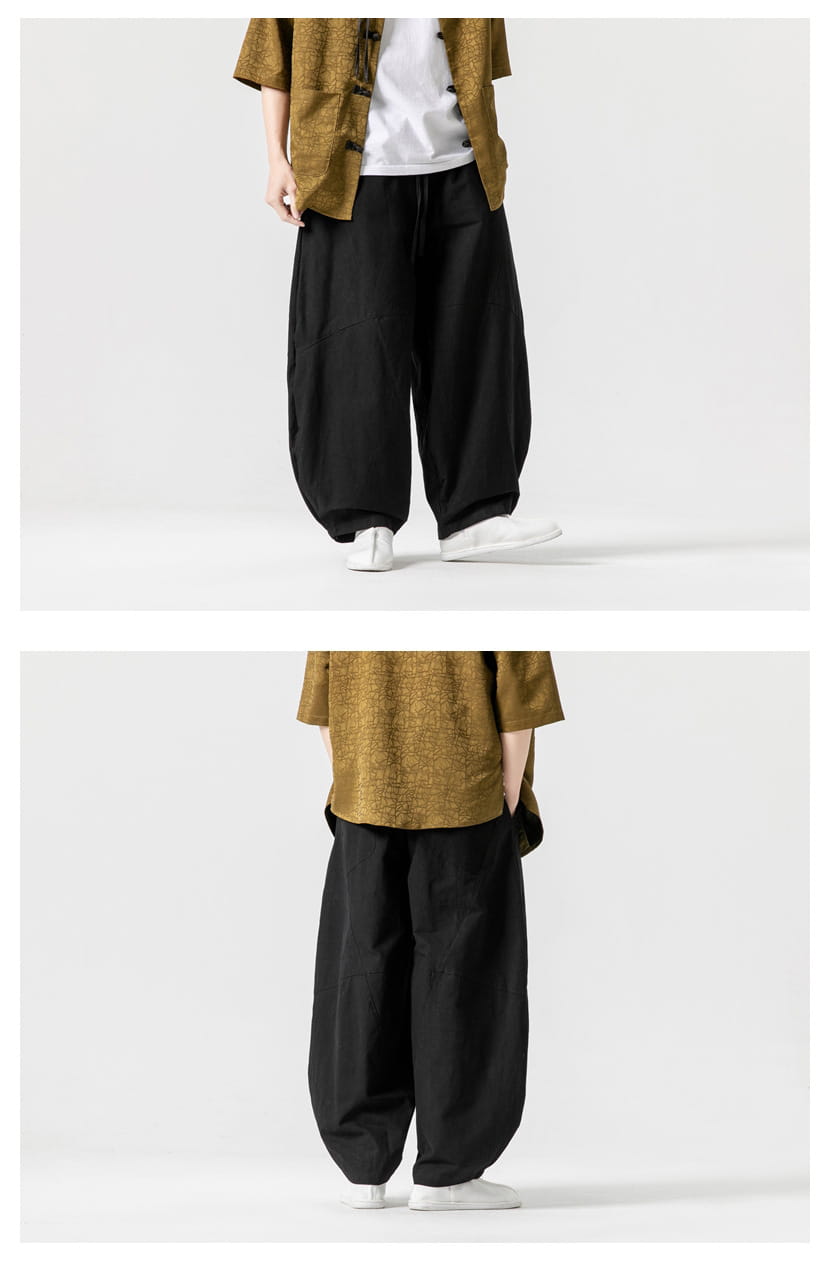 Pantalon ample en lin de tai-chi noir, coupe ample, avec découpe jambe large décontractée et taille à cordon, conçu pour un confort décontracté.