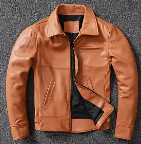 Men’s tan cowhide leather motorcycle jacket with black inner lining and zipper closure.